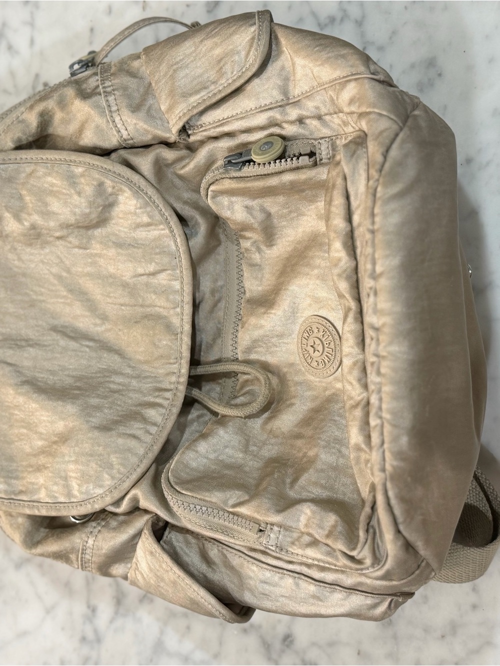 Kipling Metallic Champagne Shoulder Bag with Round Logo